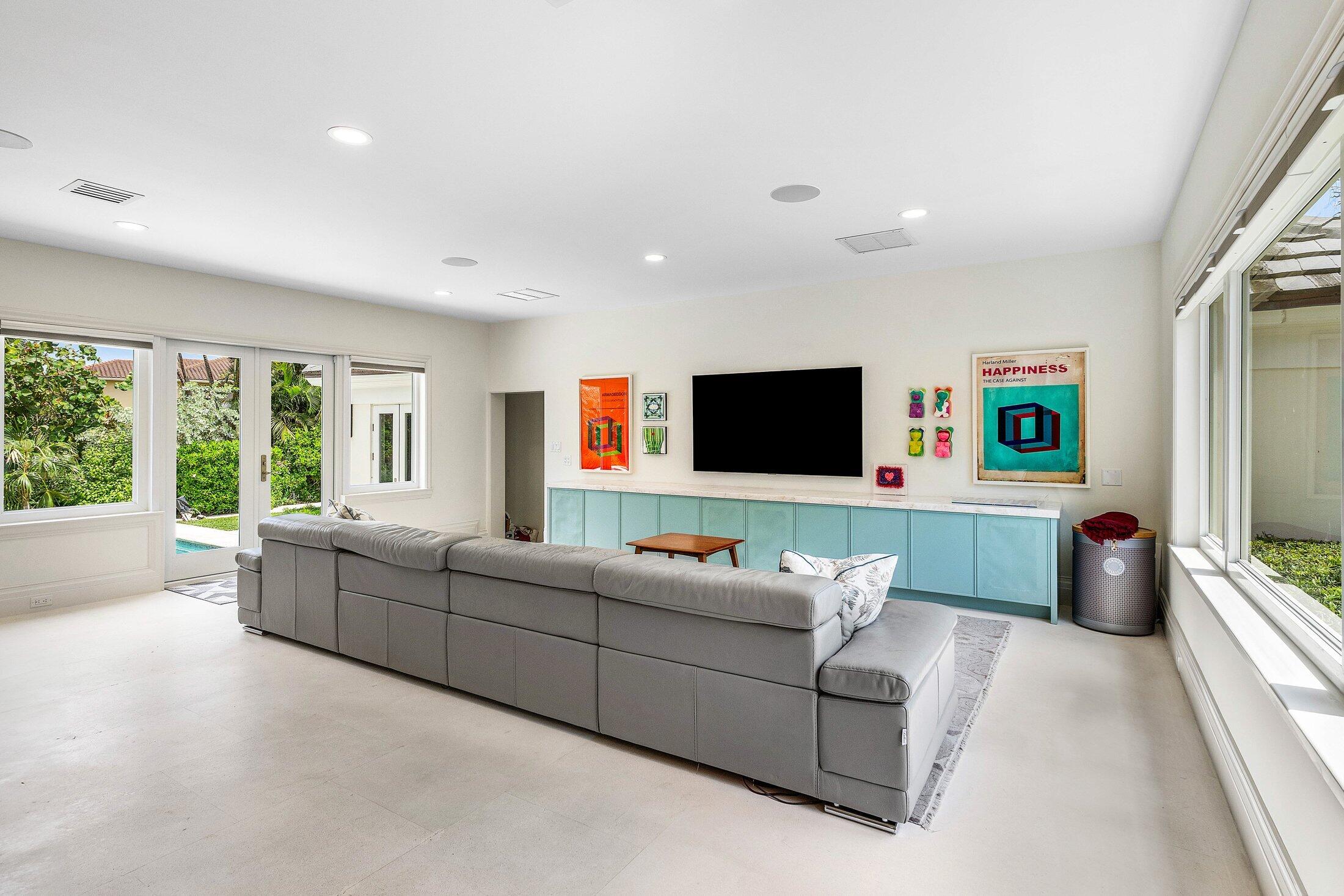 5 Osprey Court Ocean Ridge, FL 33435 - Photo 21 of 39 a living room with furniture and a flat screen tv