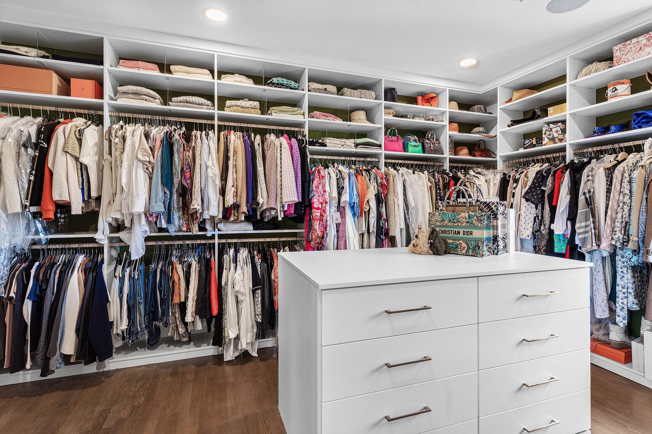 5 Osprey Court Ocean Ridge, FL 33435 - Photo 31 of 39 a view of walk in closet with clothes and shoes