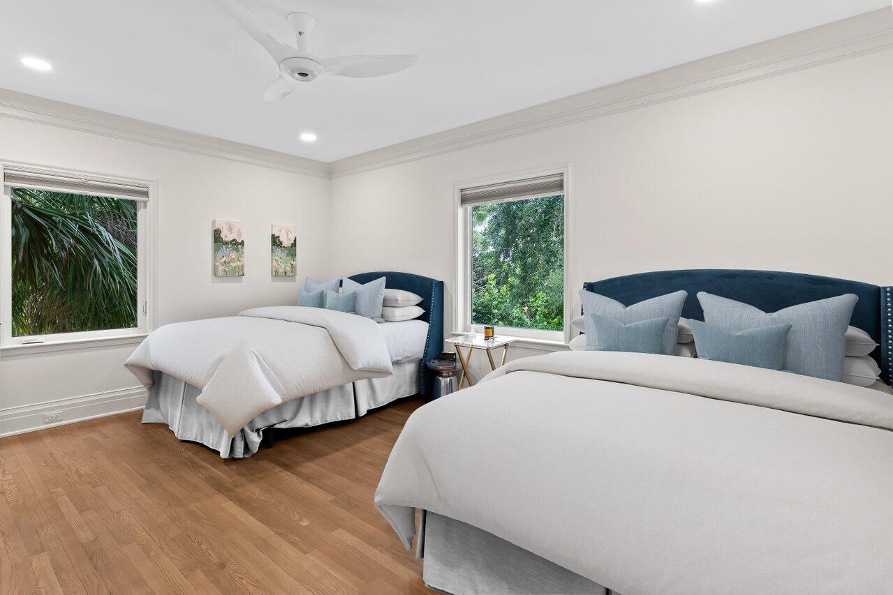 5 Osprey Court Ocean Ridge, FL 33435 - Photo 35 of 39 a bed room with two beds and a large window