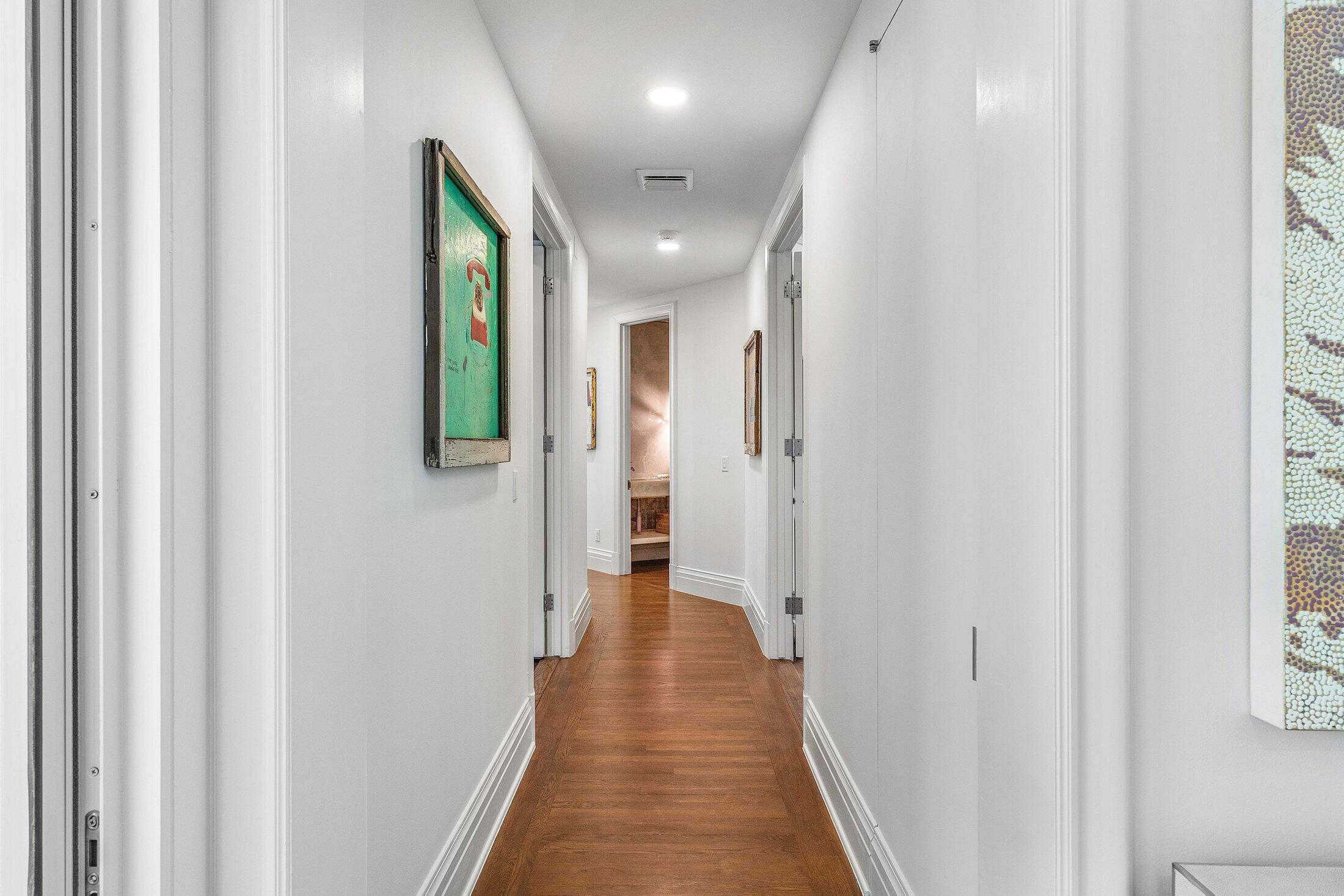 5 Osprey Court Ocean Ridge, FL 33435 - Photo 6 of 39 a view of a hallway with wooden floor