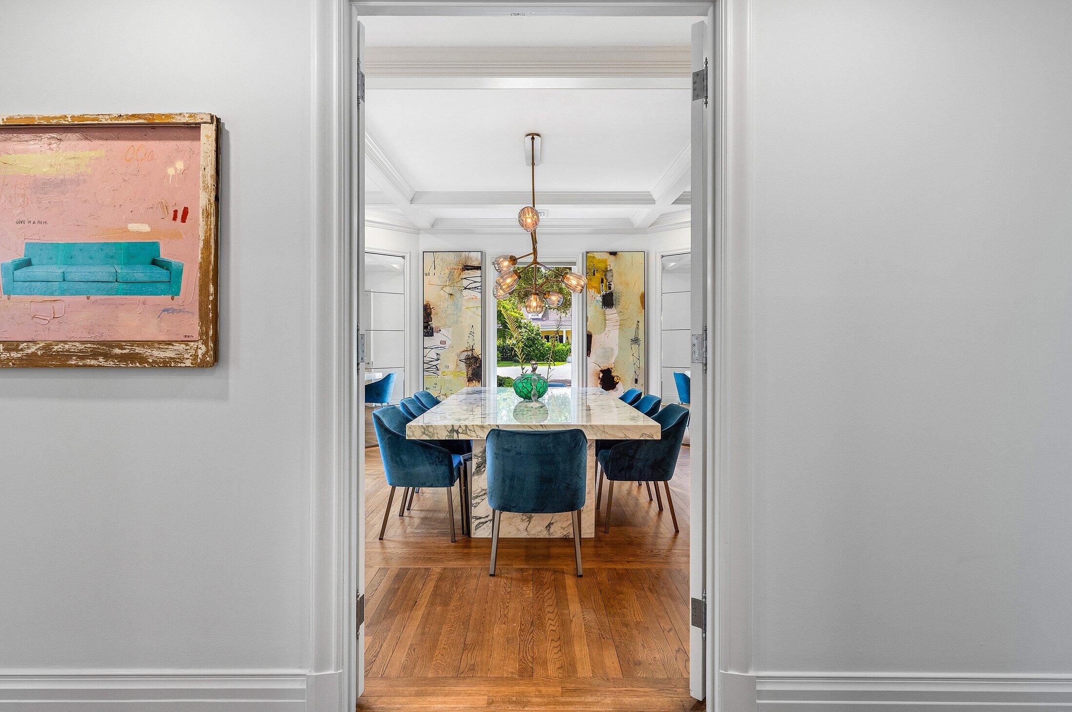 5 Osprey Court Ocean Ridge, FL 33435 - Photo 7 of 39 a view of a dining room with furniture and wooden floor