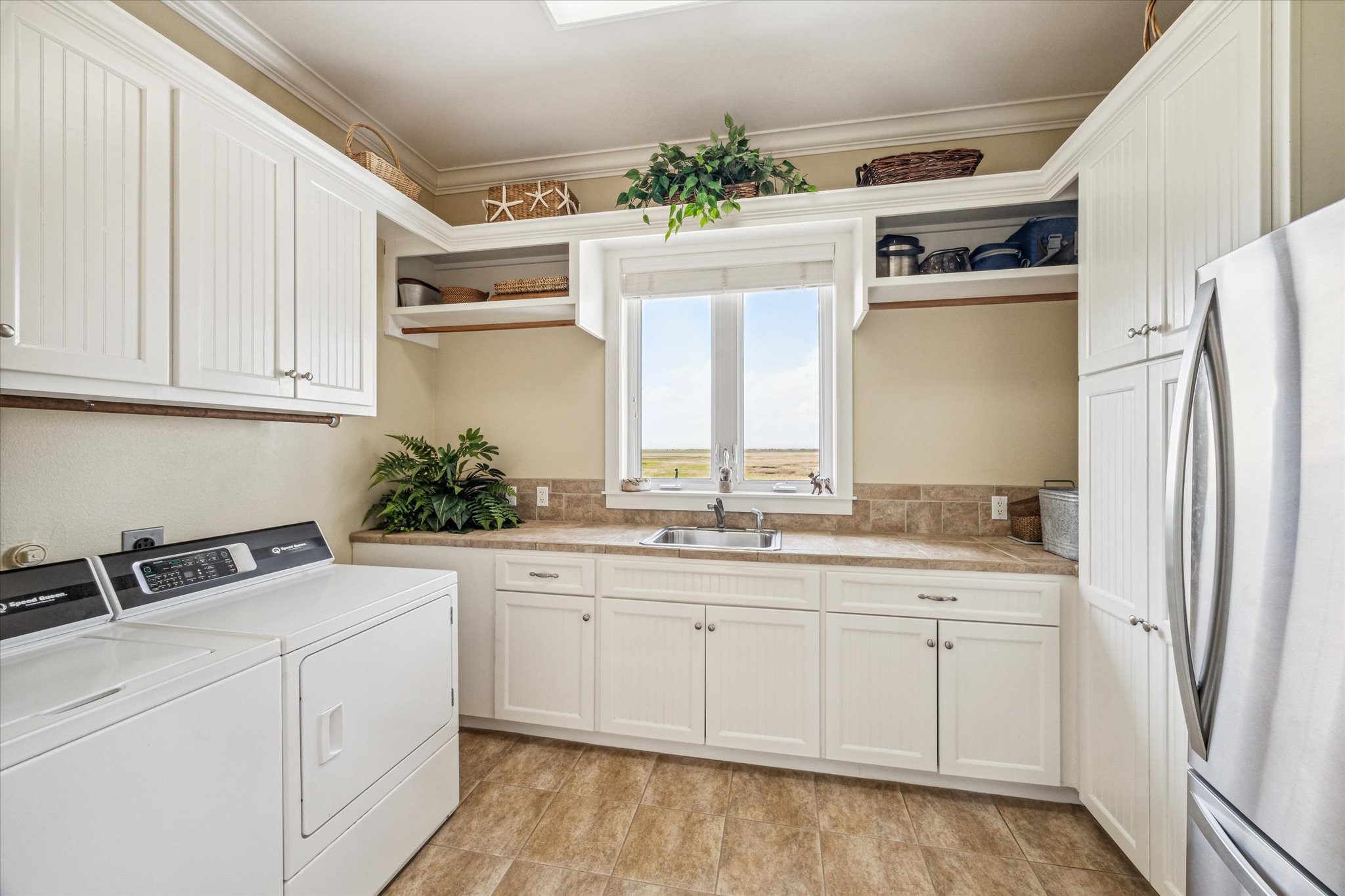 1 Shell Key Hitchcock, TX 77563 - Photo 23 of 50 Generously sized laundry room featuring dedicated space for a second refrigerator or freezer