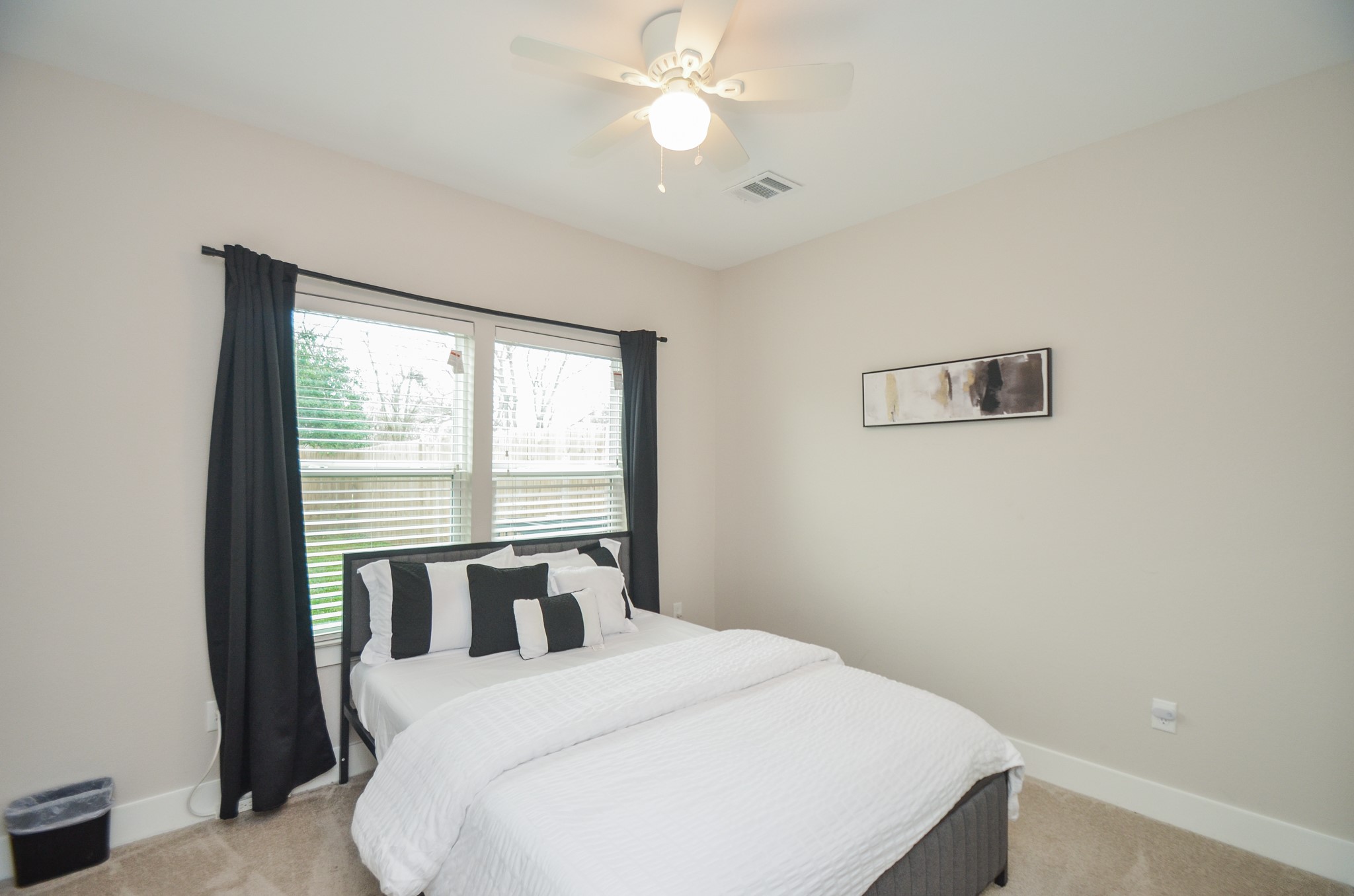 4511 Reed Road Houston, TX 77051 - Photo 34 of 39 a bedroom with a bed and a window