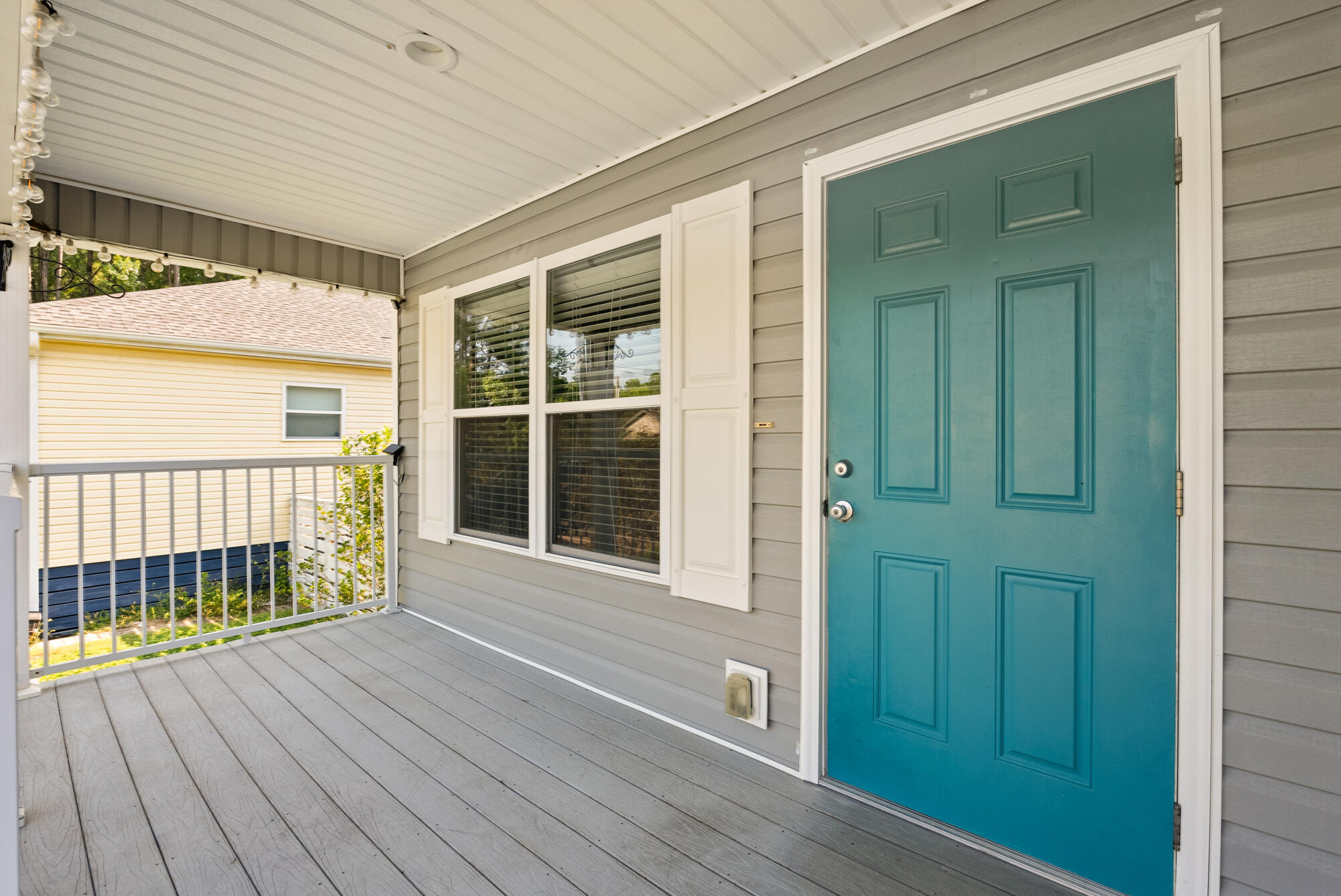 59 6th Street Santa Rosa Beach, FL 32459 - Photo 4 of 43 an empty room with wooden floor and windows