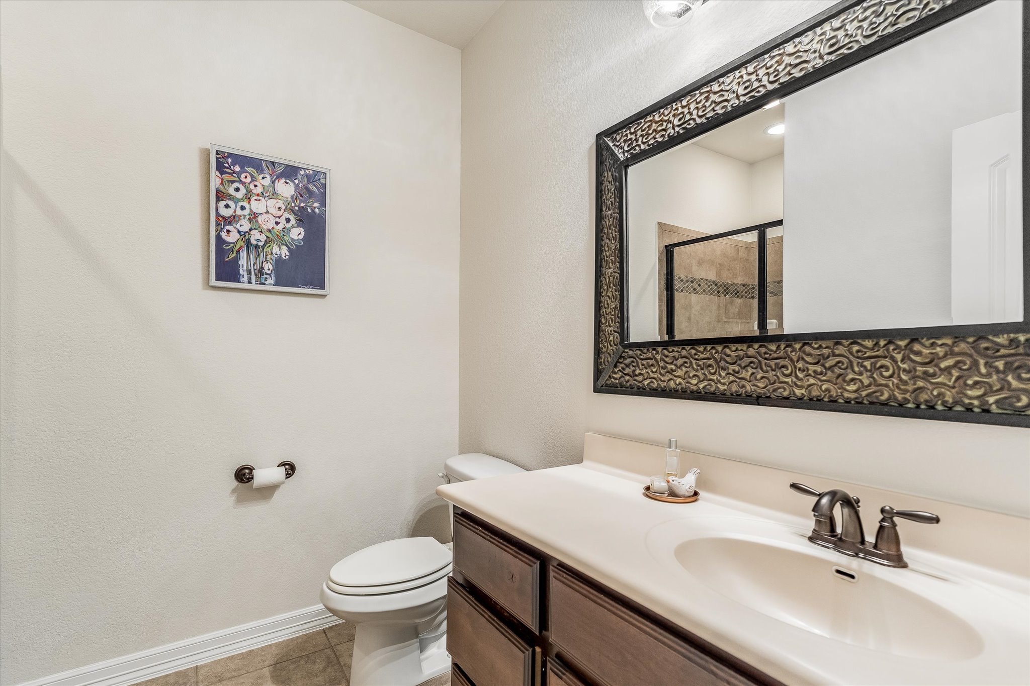 226 Galloway Lane Austin, TX 78737 - Photo 20 of 30 Full bathroom with vanity, a stall shower, and light tile patterned flooring