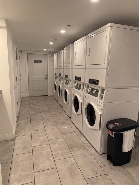69 North Common Street, Unit 3 Lynn, MA 01902 - Photo 15 of 15 a utility room with dryer and washer