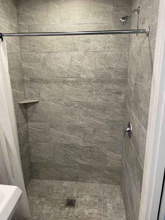69 North Common Street, Unit 3 Lynn, MA 01902 - Photo 10 of 15 a bathroom with a shower