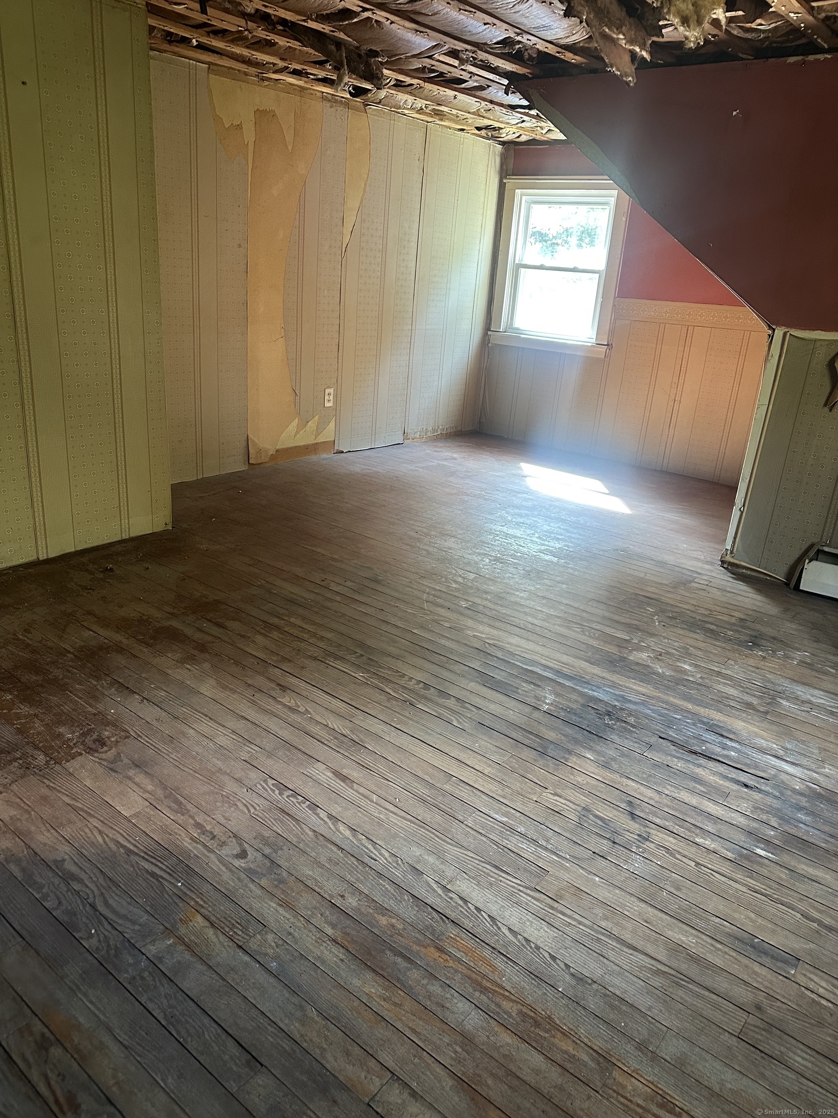 864 Boston Turnpike Coventry, CT 06238 - Photo 14 of 18 a view of a room with wooden floor and a window