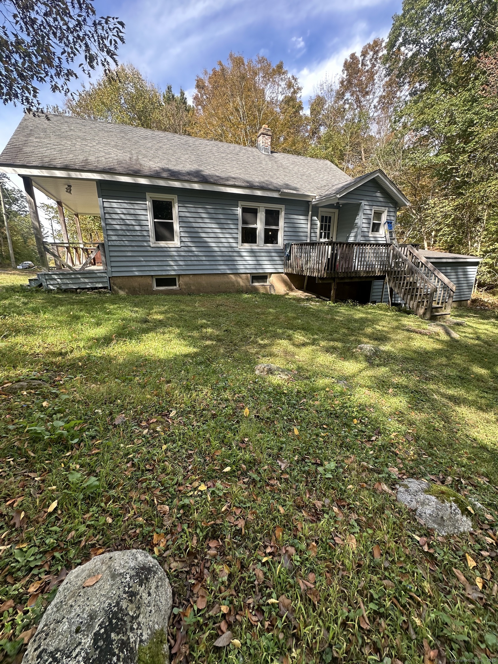 864 Boston Turnpike Coventry, CT 06238 - Photo 18 of 18 a front view of house with yard outdoor seating and barbeque oven