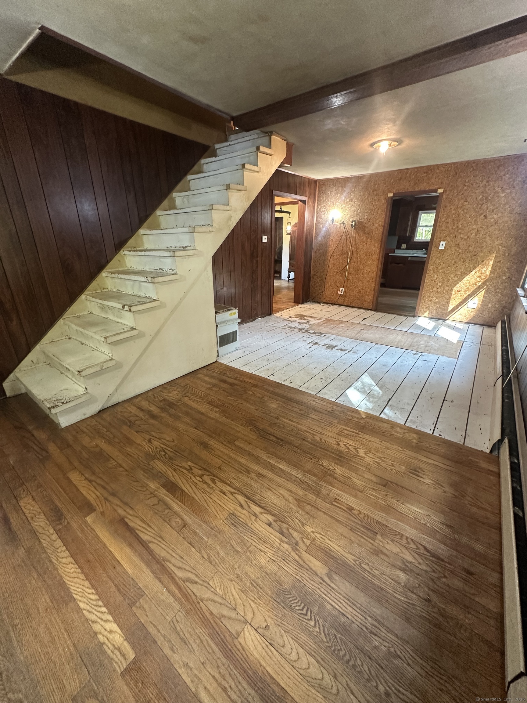 864 Boston Turnpike Coventry, CT 06238 - Photo 10 of 18 a bedroom with a bed and a chandelier