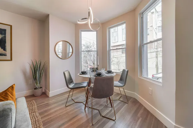 a bed room with a bed and window