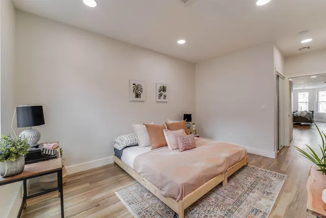 a bathroom with a sink a toilet and bathtub