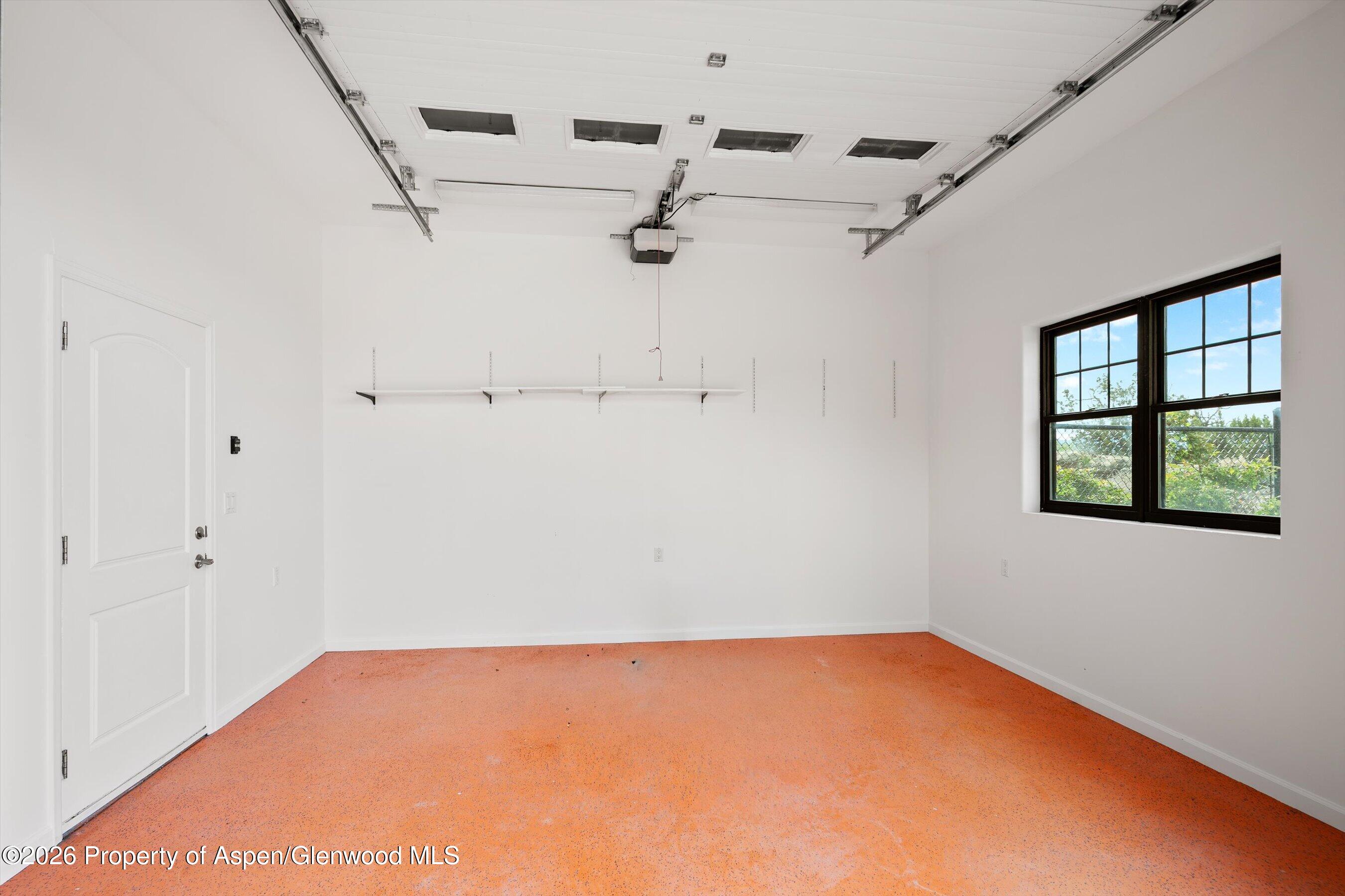 450 Summer Falls Road Silt, CO 81652 - Photo 33 of 50 an empty room with windows
