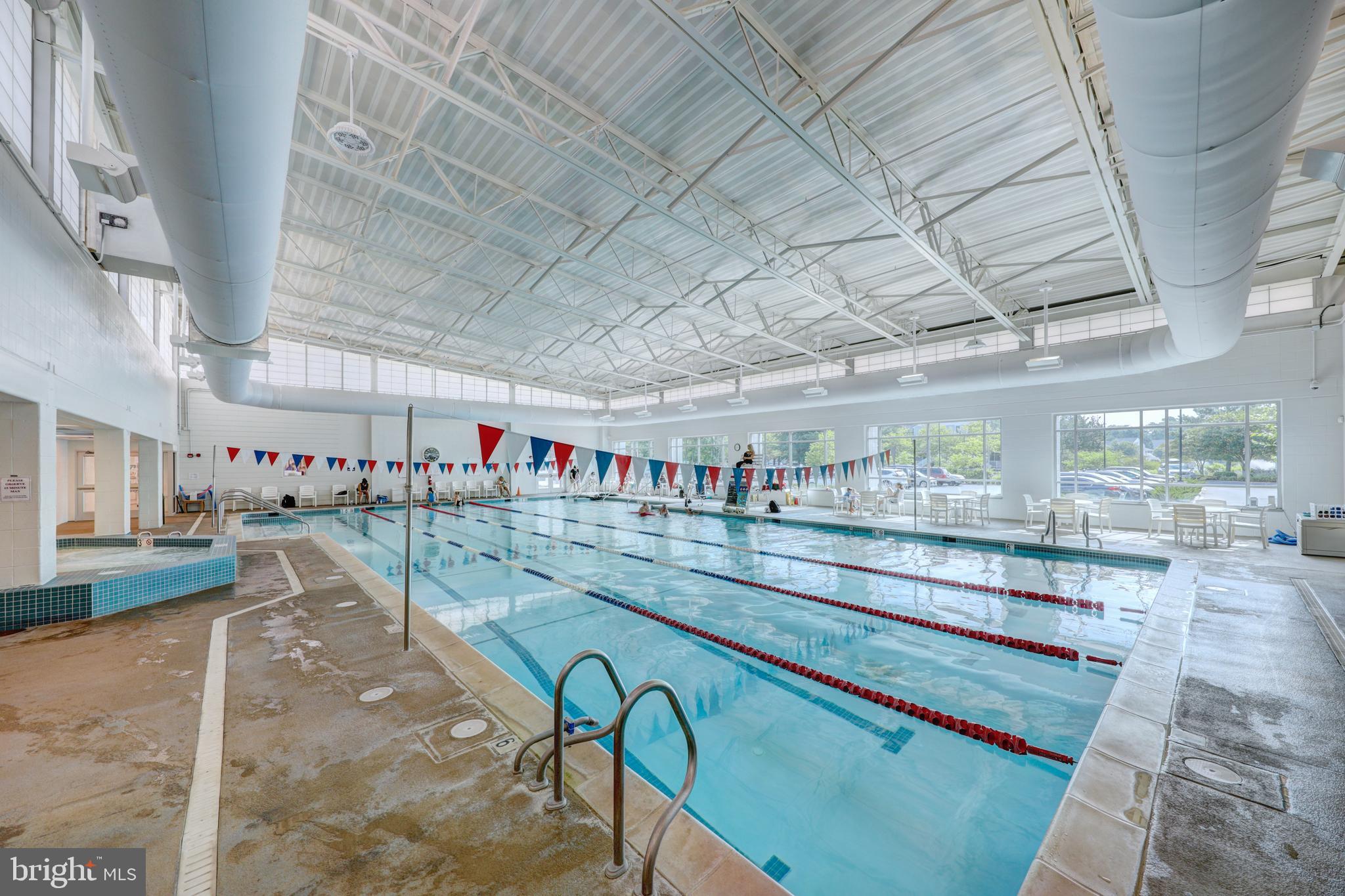 39346 Racquet Lane, Unit 8504 Bethany Beach, DE 19930 - Photo 35 of 40 a utility room with lots of wooden furniture