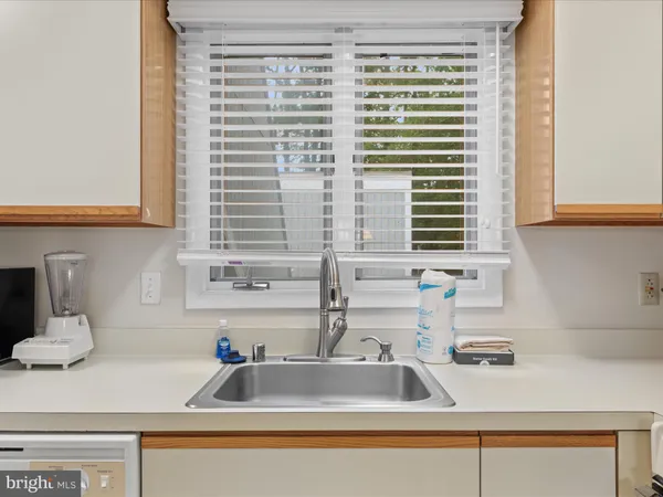 a kitchen sink with a window