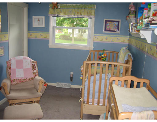 17 Tioga Street Springfield, MA 01128 - Photo 3 of 7 a room with furniture and a window