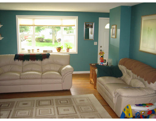 17 Tioga Street Springfield, MA 01128 - Photo 6 of 7 a living room with furniture and a large window