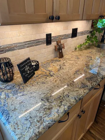a kitchen with a sink and cabinets