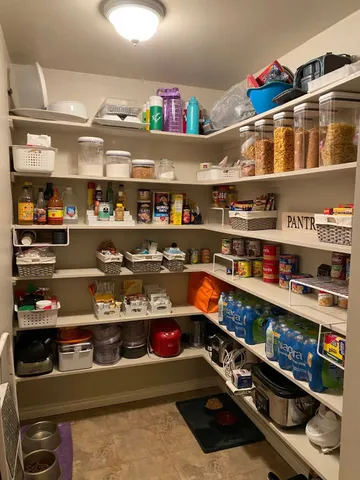 a room with lots of different colored cloths