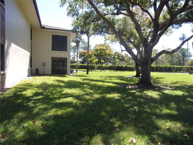 a living room with large windows
