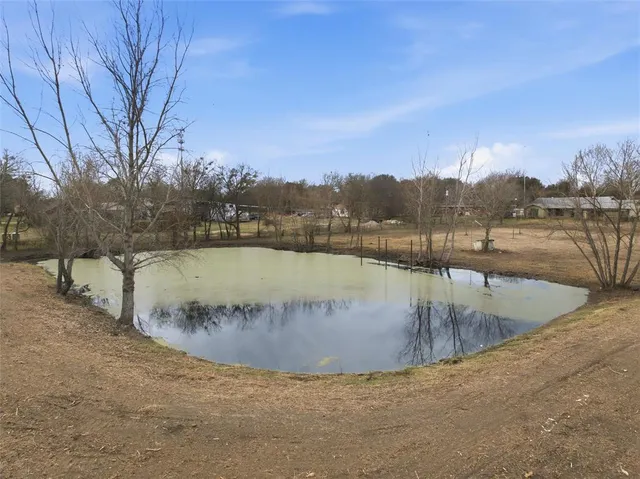 a view of a swimming pool with a lake