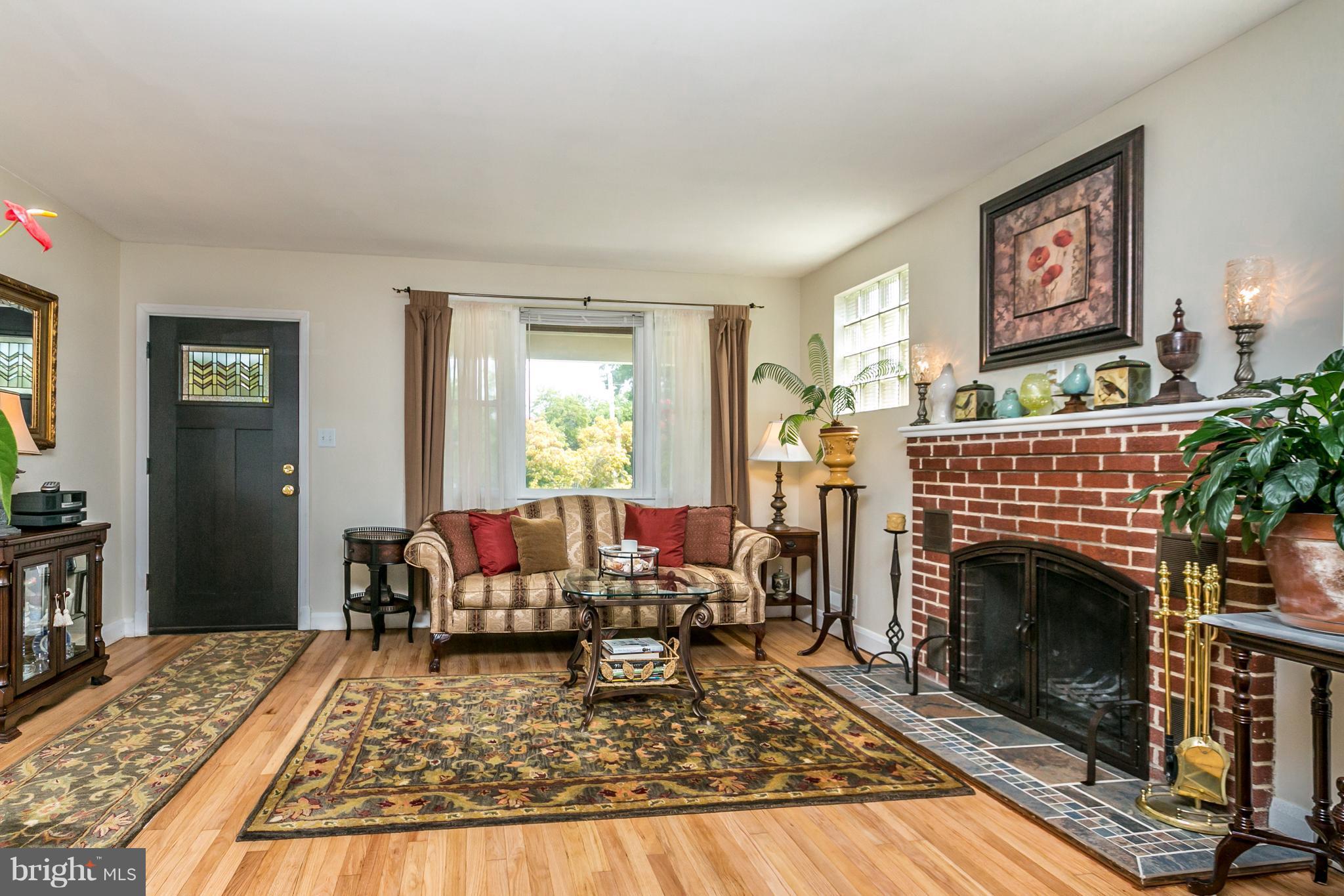8718 Avondale Road Baltimore, MD 21234 - Photo 3 of 30 Living Room with Wood Burning Fireplace