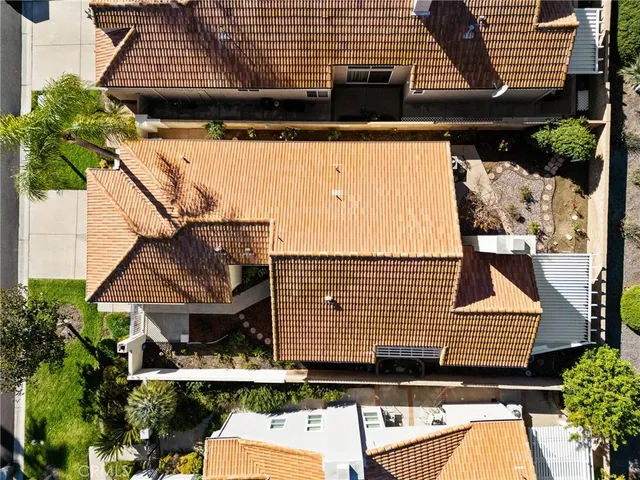 a view of house with pool outdoor seating area