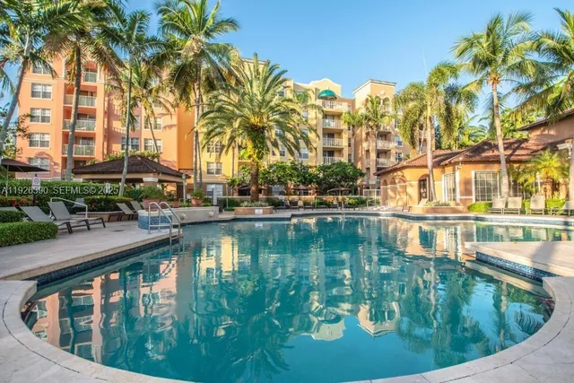 a view of swimming pool from a lake view