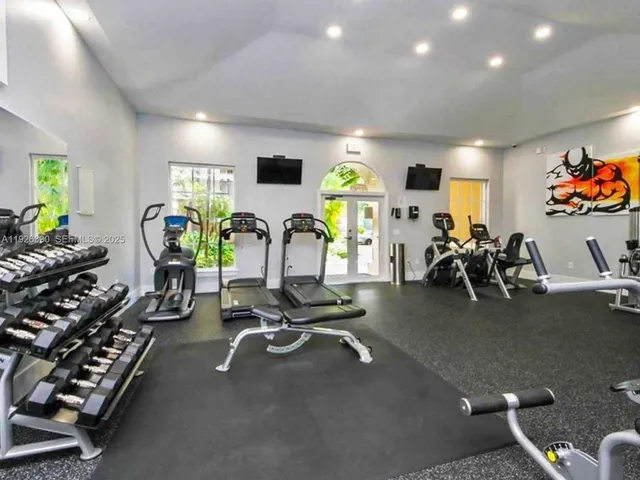 a view of a room with gym equipment