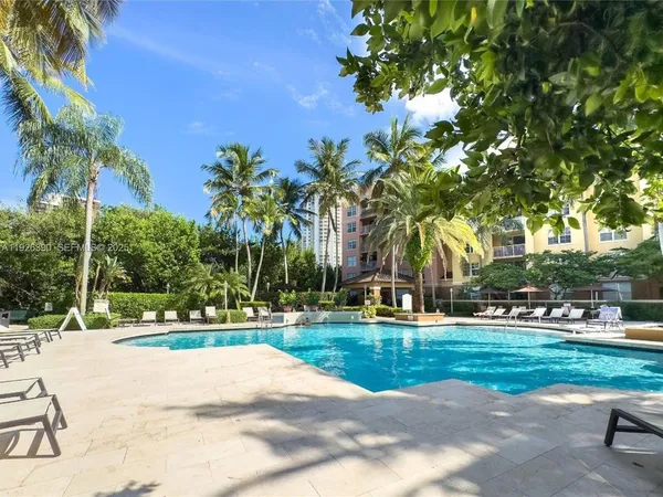 a building with trees in the background