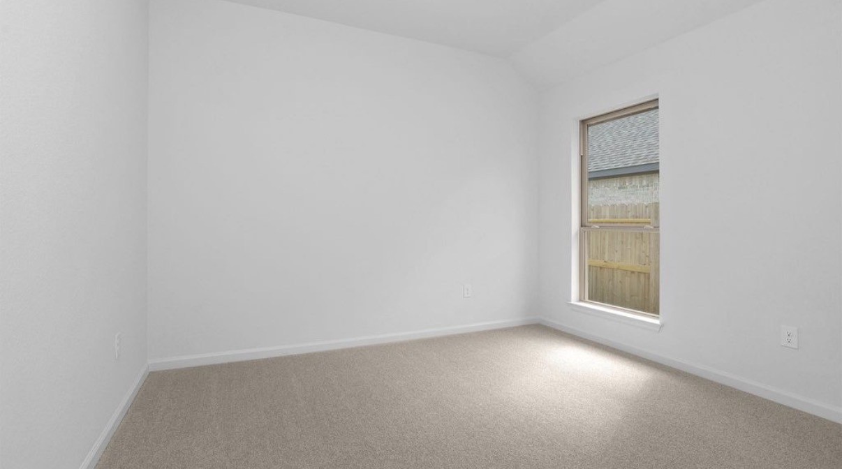 303 Eileen Drive Rosenberg, TX 77471 - Photo 12 of 17 a view of an empty room with a window