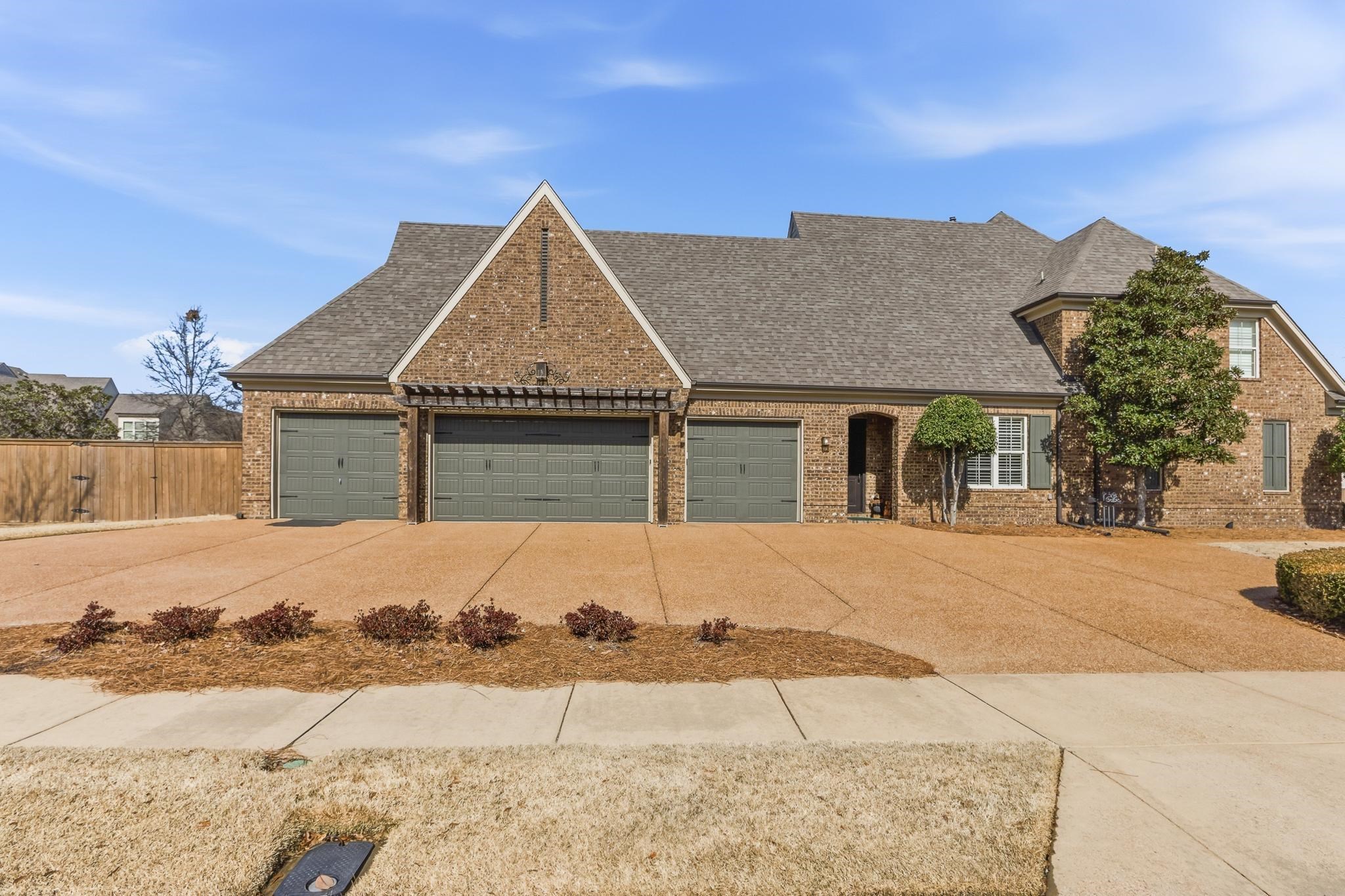 1301 Conser Street Collierville, TN 38017 - Photo 2 of 40 front view of a house with a outdoor space