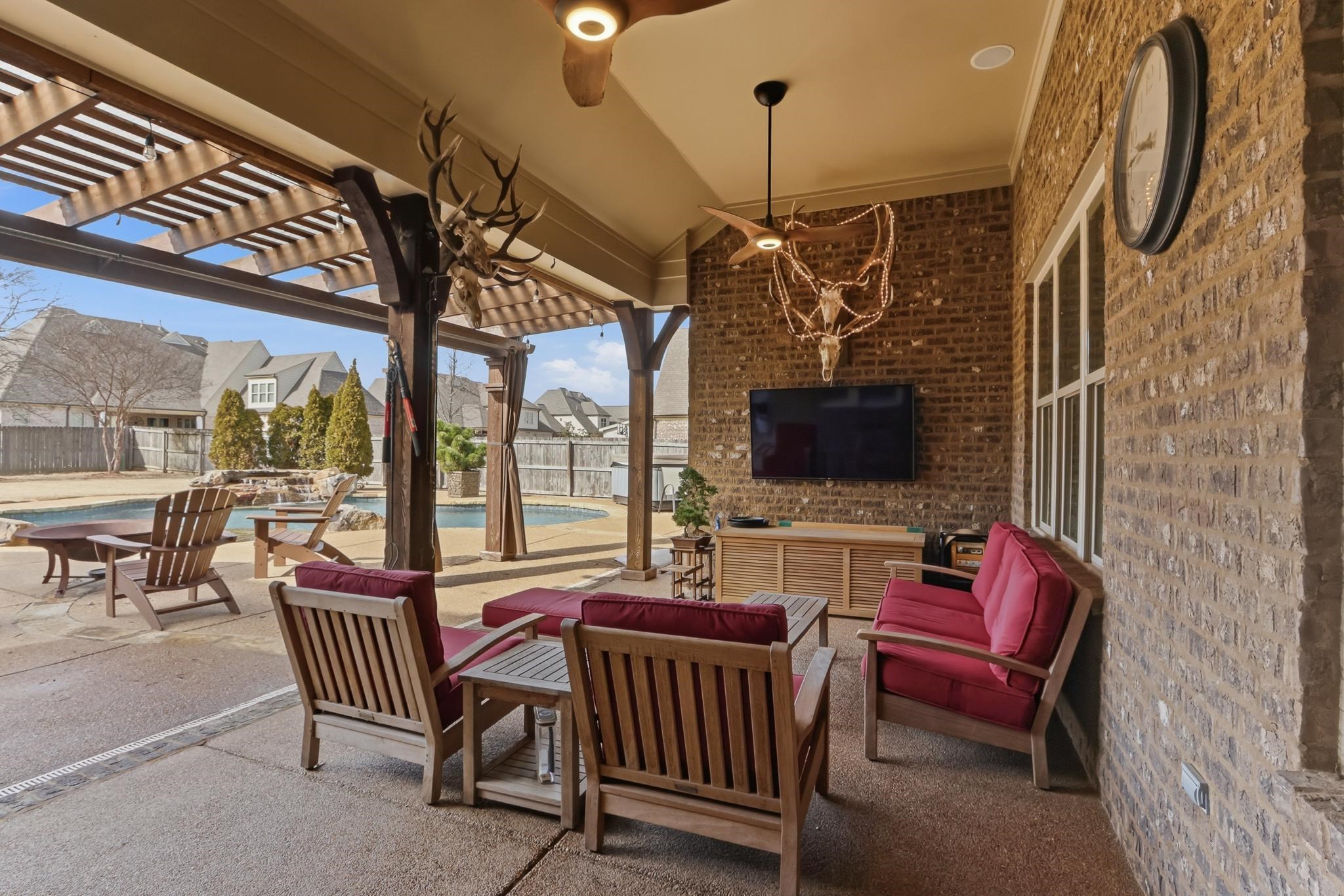 1301 Conser Street Collierville, TN 38017 - Photo 28 of 40 a view of a livingroom with furniture and a flat screen tv