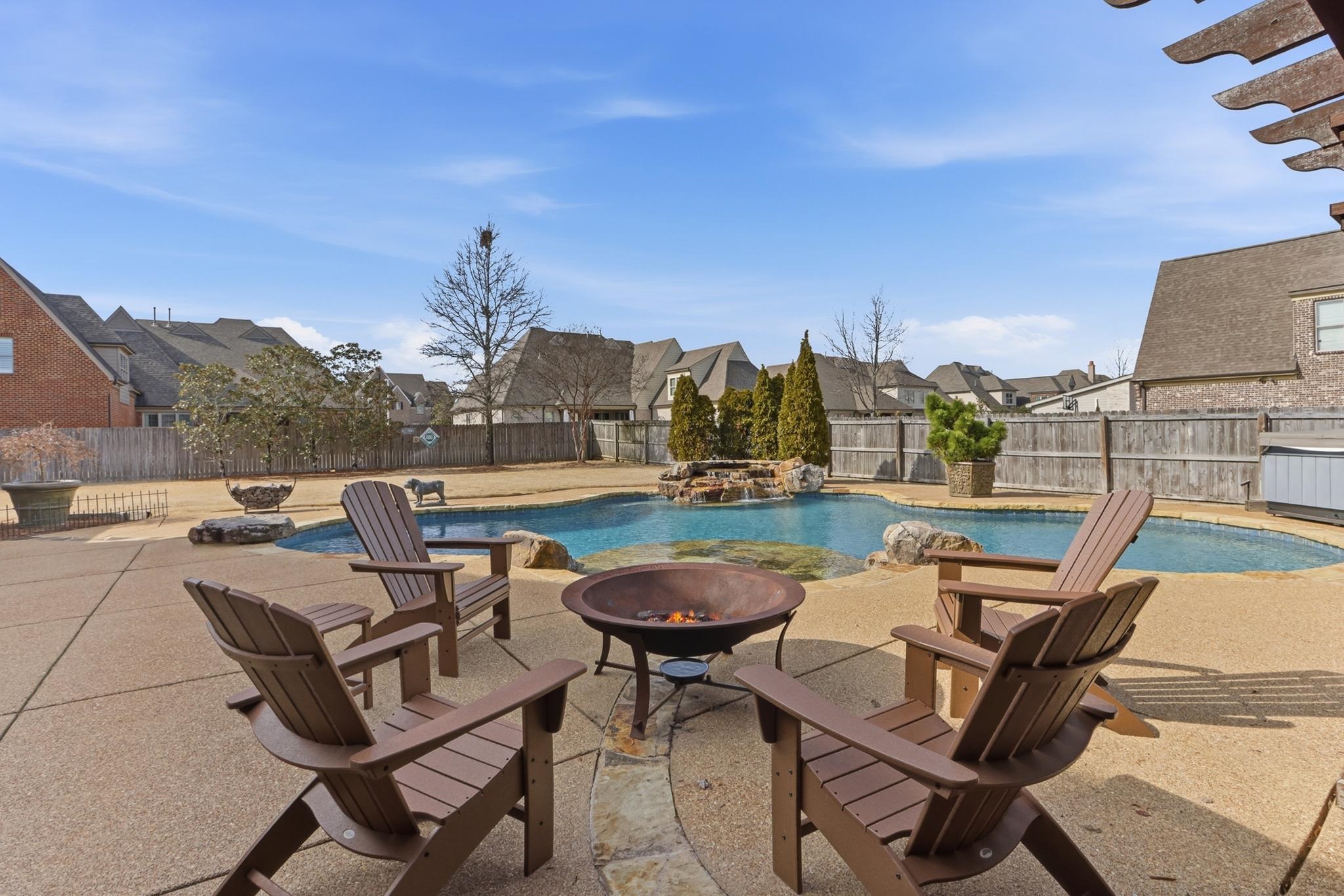 1301 Conser Street Collierville, TN 38017 - Photo 29 of 40 a view of a terrace with furniture and a garden