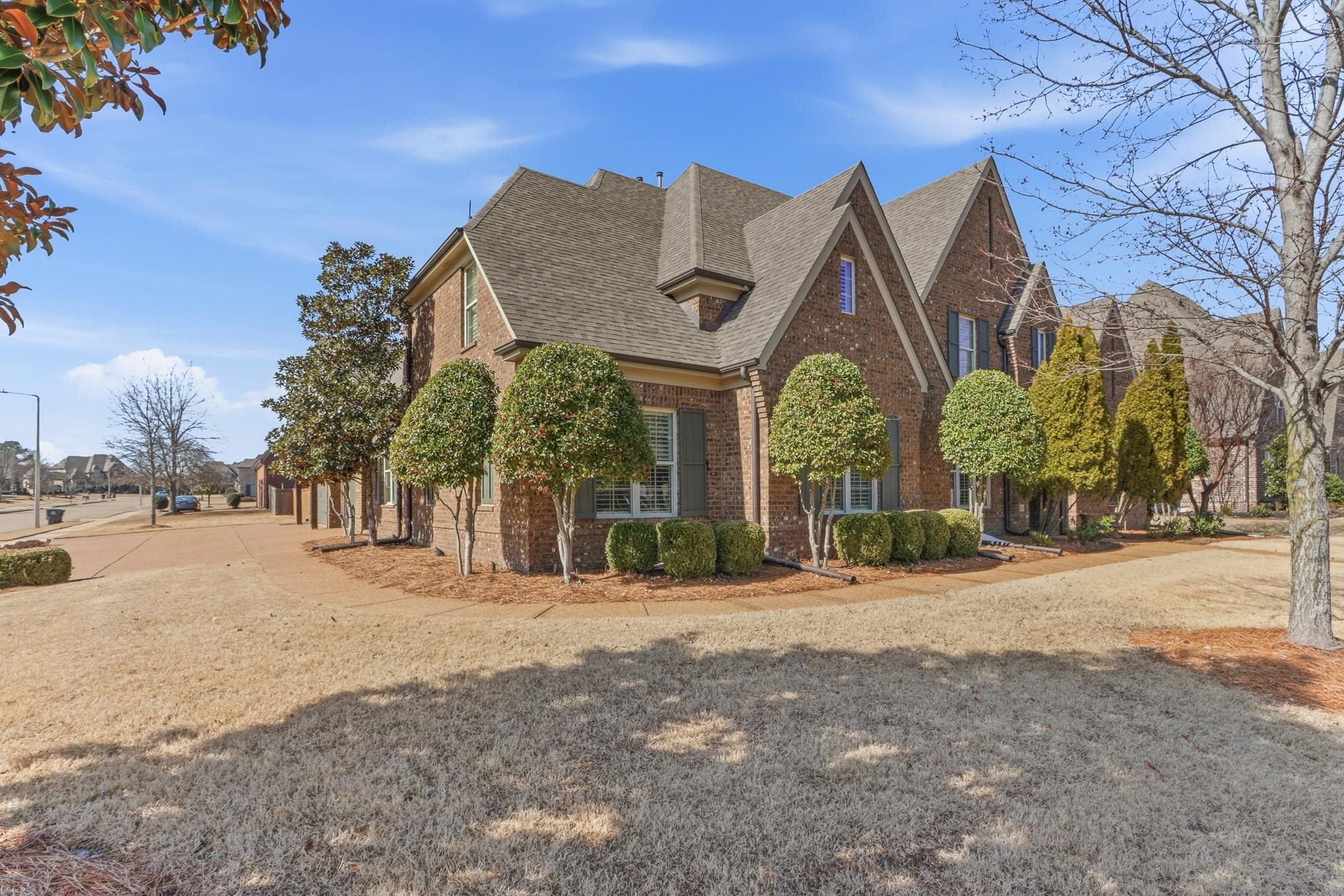 1301 Conser Street Collierville, TN 38017 - Photo 3 of 40 a view of a house with a snow in the yard