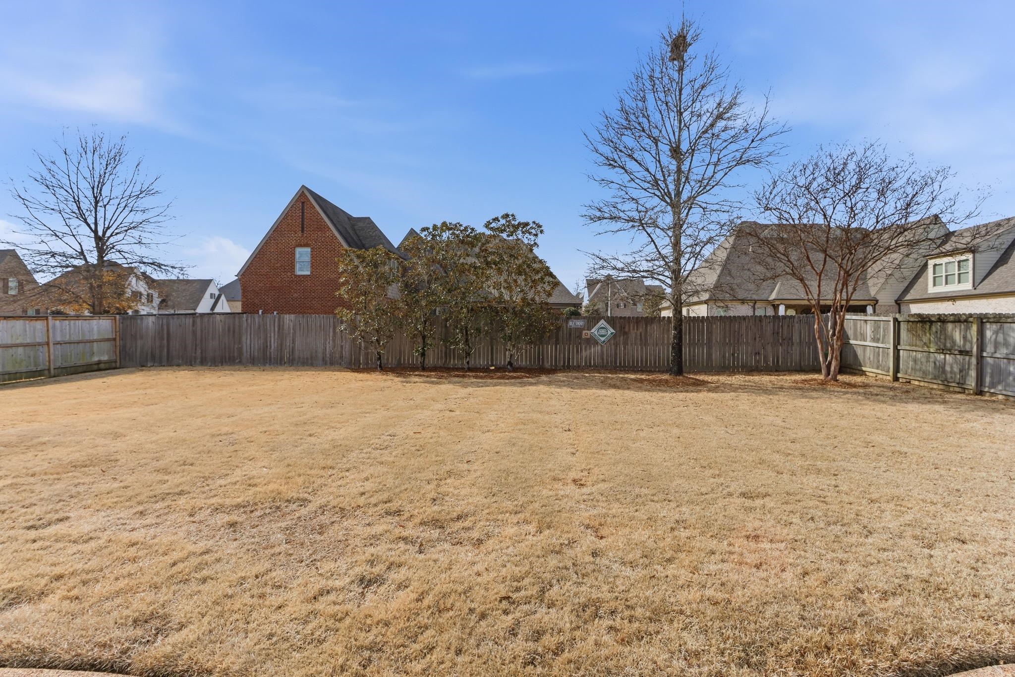 1301 Conser Street Collierville, TN 38017 - Photo 33 of 40 a front view of house with yard and trees
