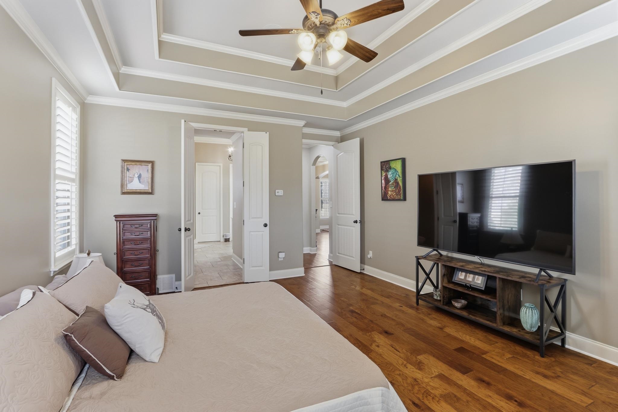 1301 Conser Street Collierville, TN 38017 - Photo 35 of 40 a living room with furniture and a flat screen tv