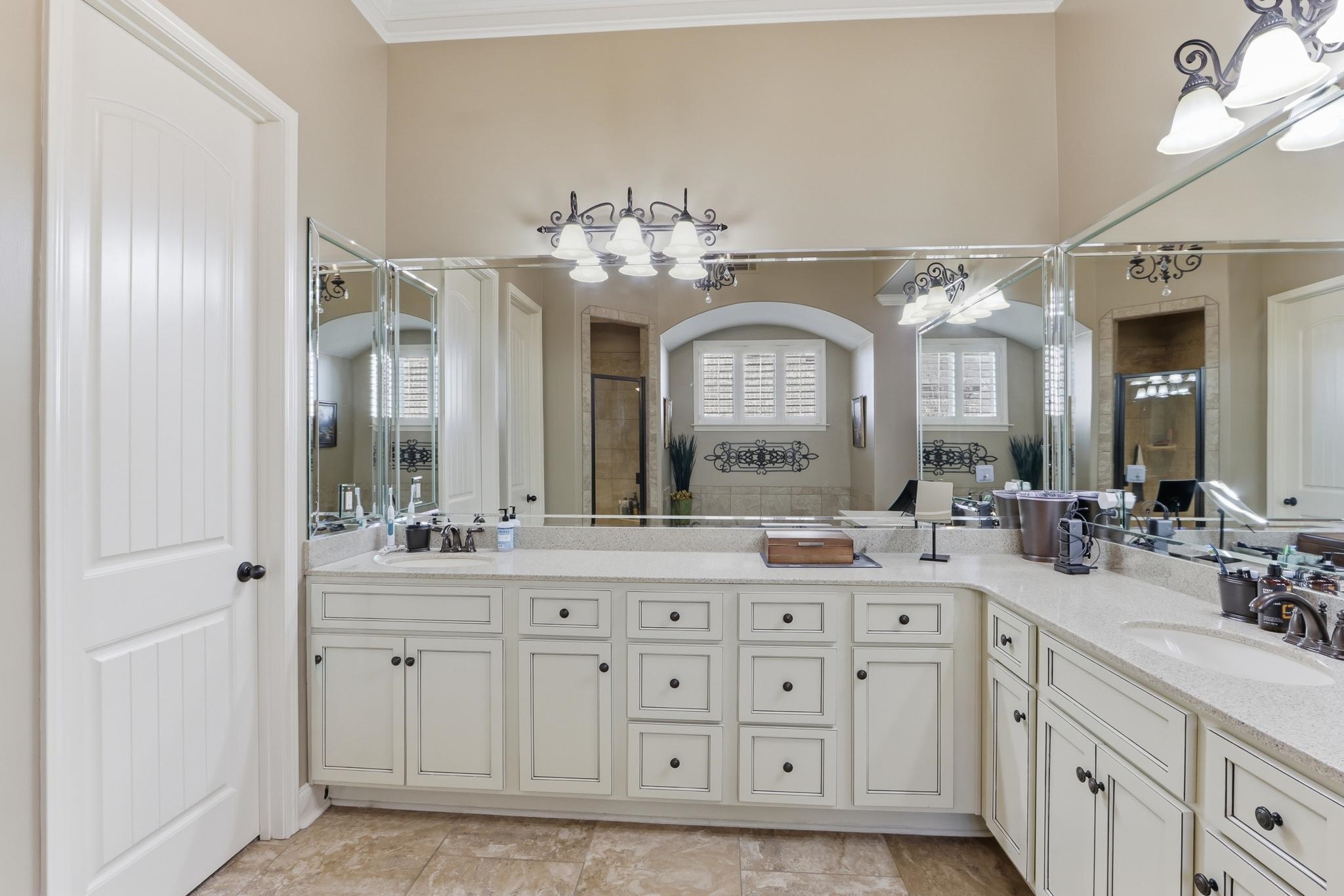 1301 Conser Street Collierville, TN 38017 - Photo 37 of 40 a spacious en suite bathroom with double sink and a mirror