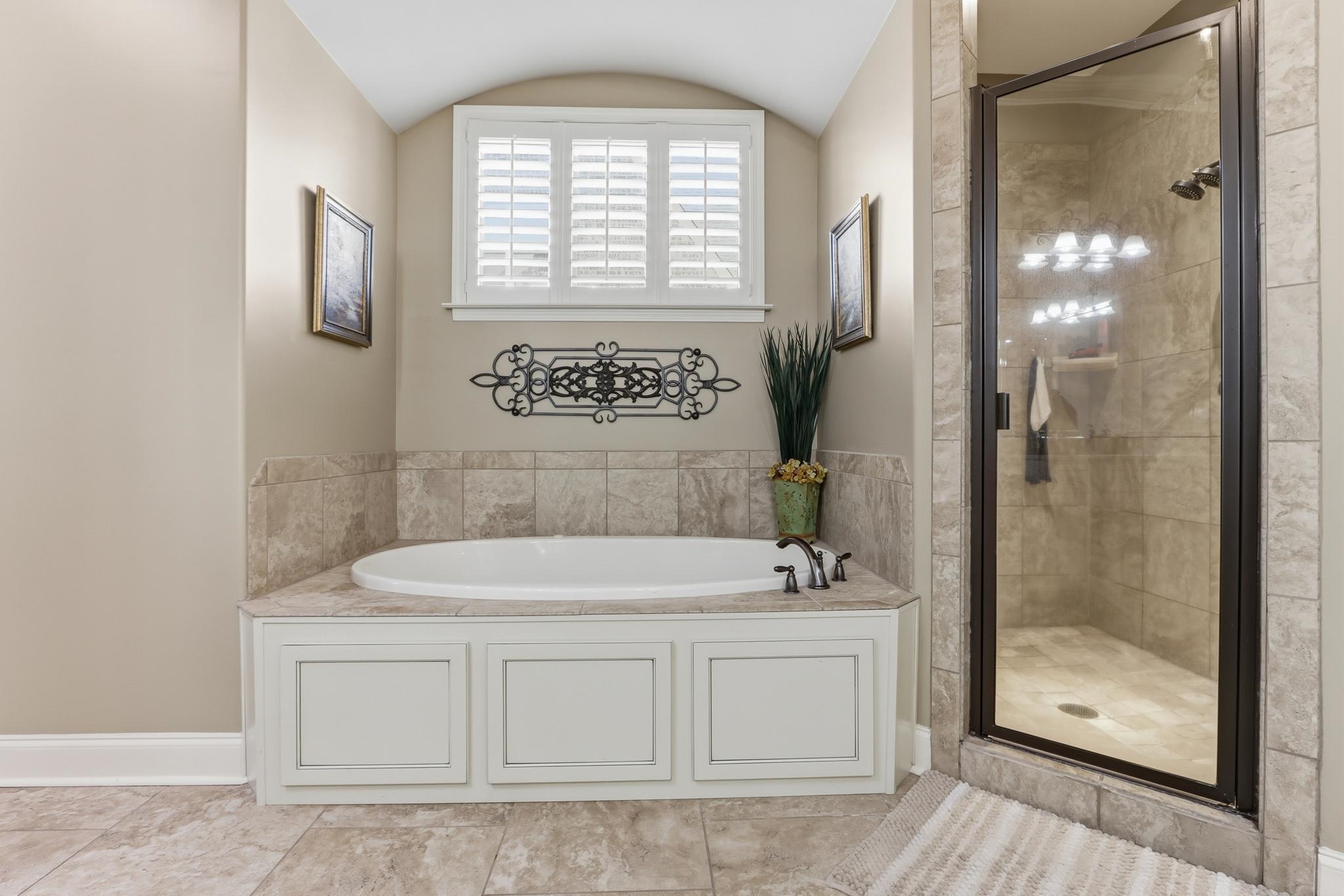 1301 Conser Street Collierville, TN 38017 - Photo 38 of 40 a bathroom with a sink a toilet and shower