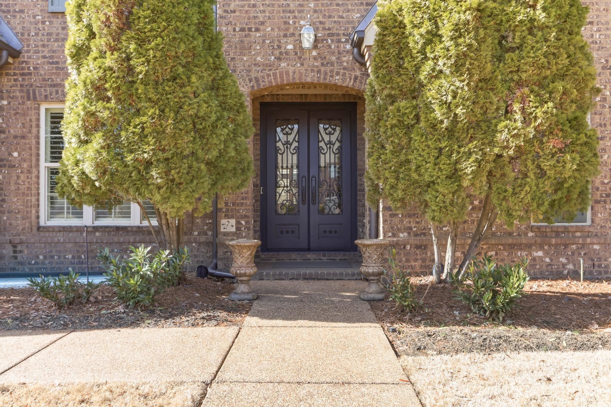 1301 Conser Street Collierville, TN 38017 - Photo 4 of 40 a front view of a house