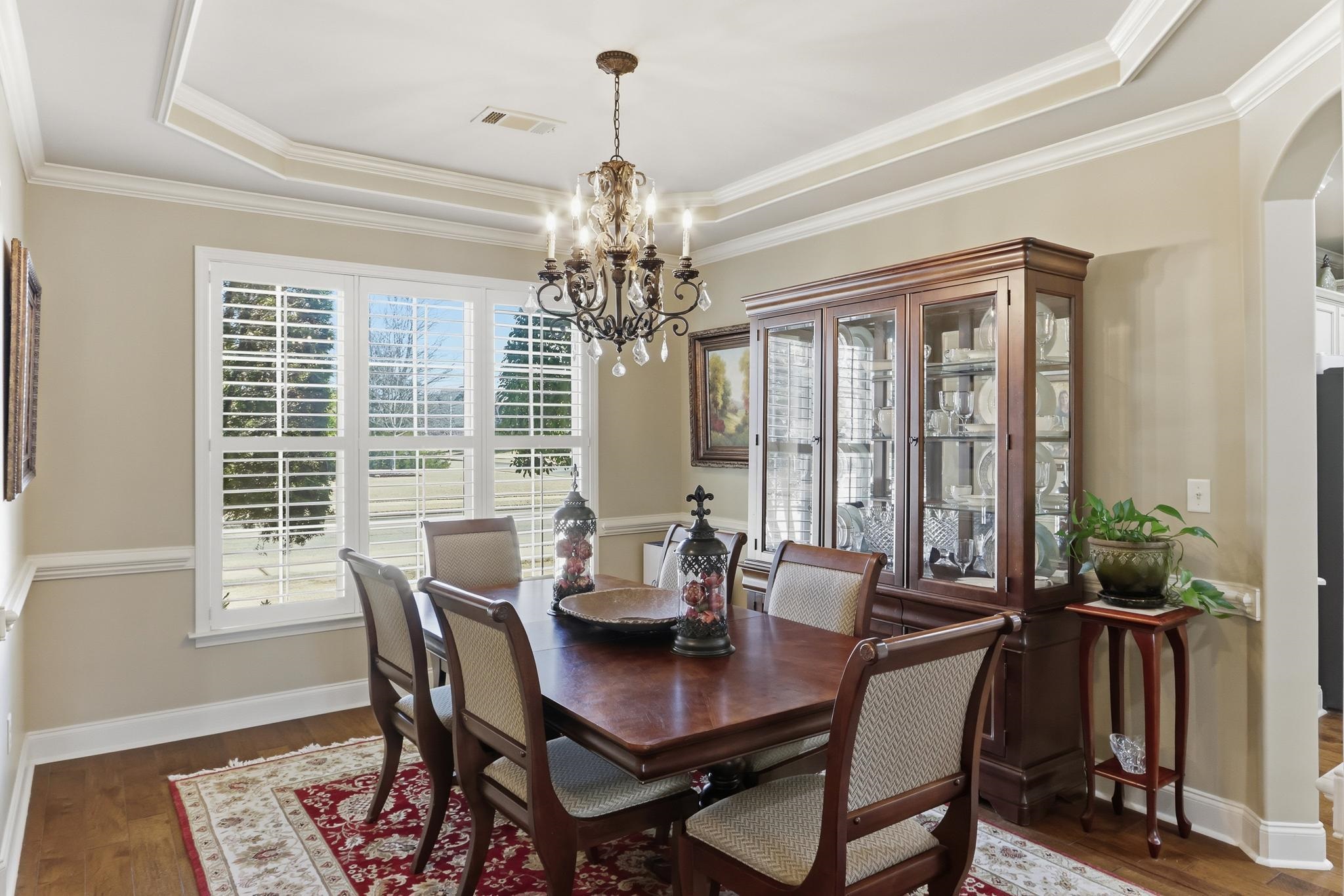 1301 Conser Street Collierville, TN 38017 - Photo 6 of 40 a view of a dining room with furniture window and wooden floor