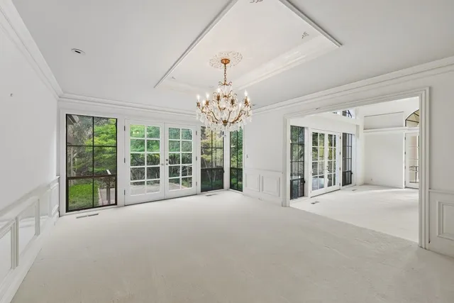 a swimming pool with outdoor seating and yard