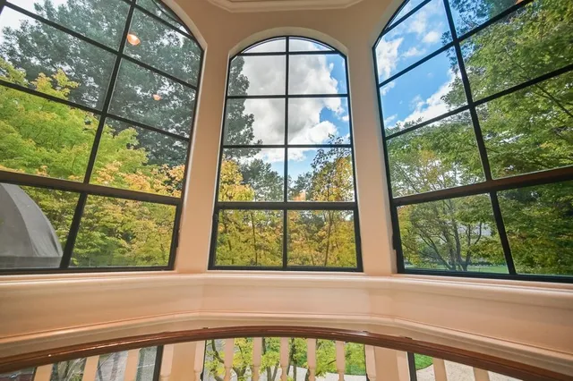 a spacious bedroom with a bed and a couch