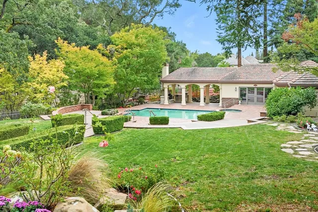 a house view with a garden space