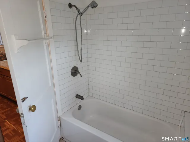 a bathroom with a bathtub
