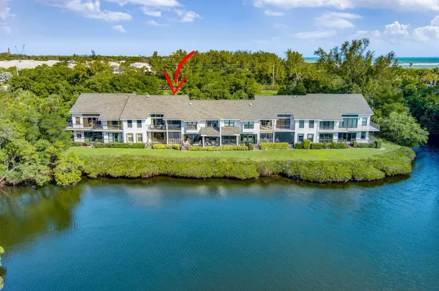 a view of a balcony with wooden floor