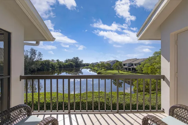 a view of a balcony with lake view