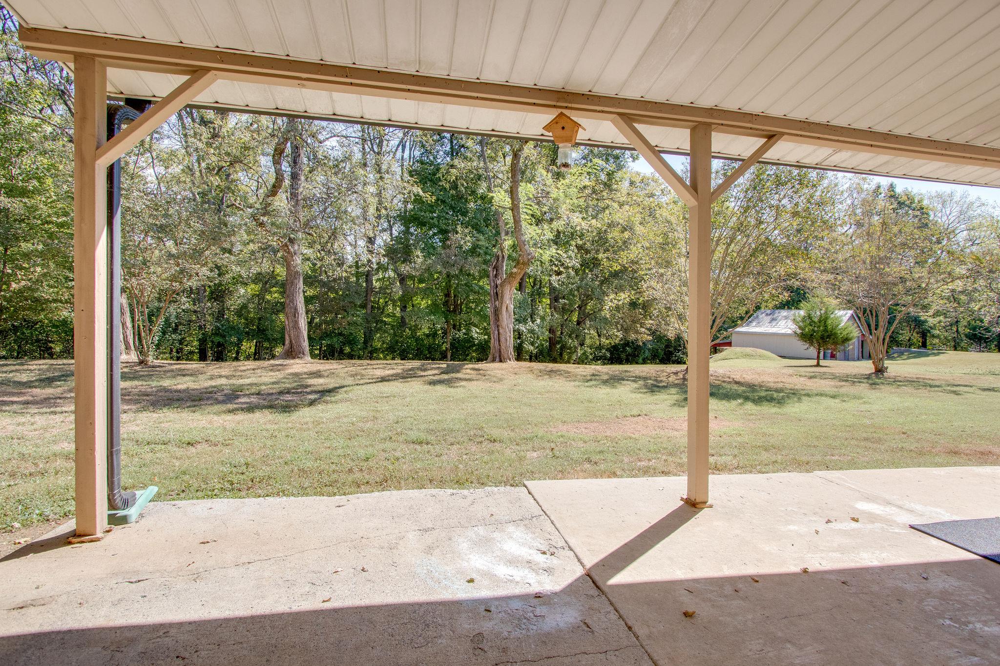 1650 North Greenhill Road Mount Juliet, TN 37122 - Photo 7 of 26 a view of a porch with yard
