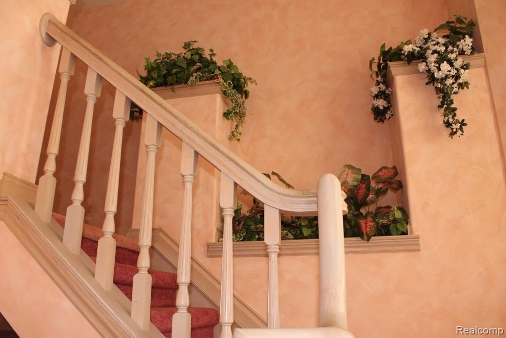 8205 Douglas Road Pinckney, MI 48169 - Photo 32 of 77 Upper custom staircase.