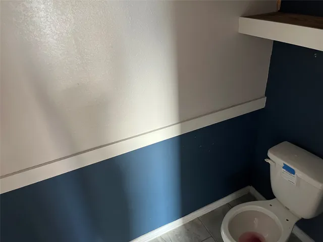 a close up of a toilet